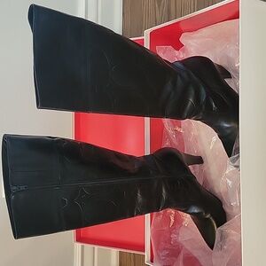 Coach leather boots.